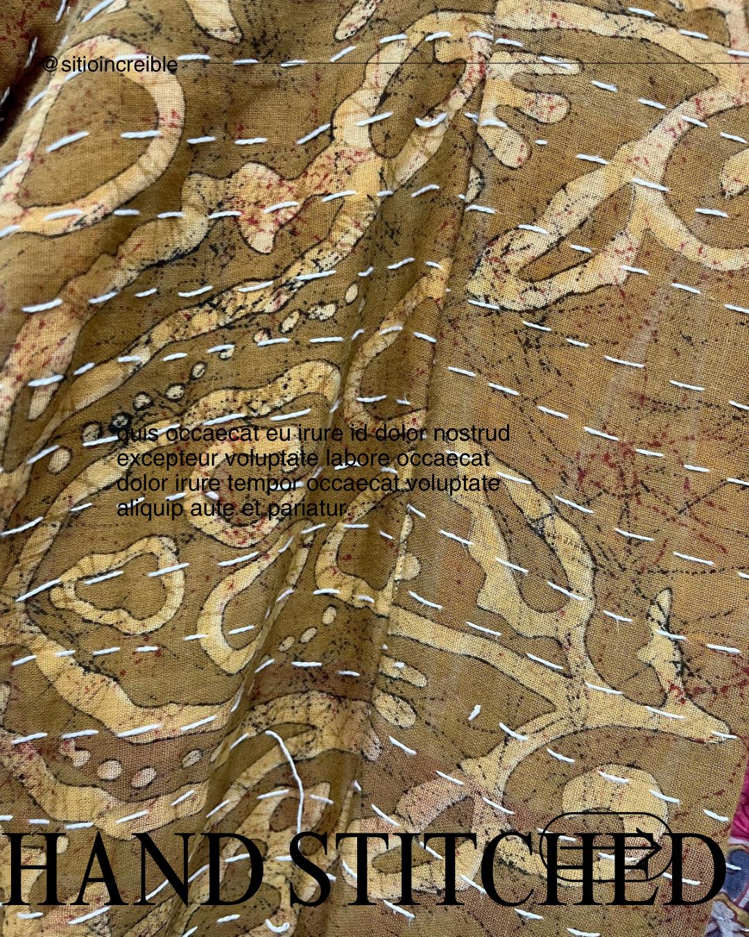 Luxury, unique, reversible quilted statement coat made for the stylish woman wanting quality over quantity. It is a light brown and beige print fabric with hot pink floral fabric inside.