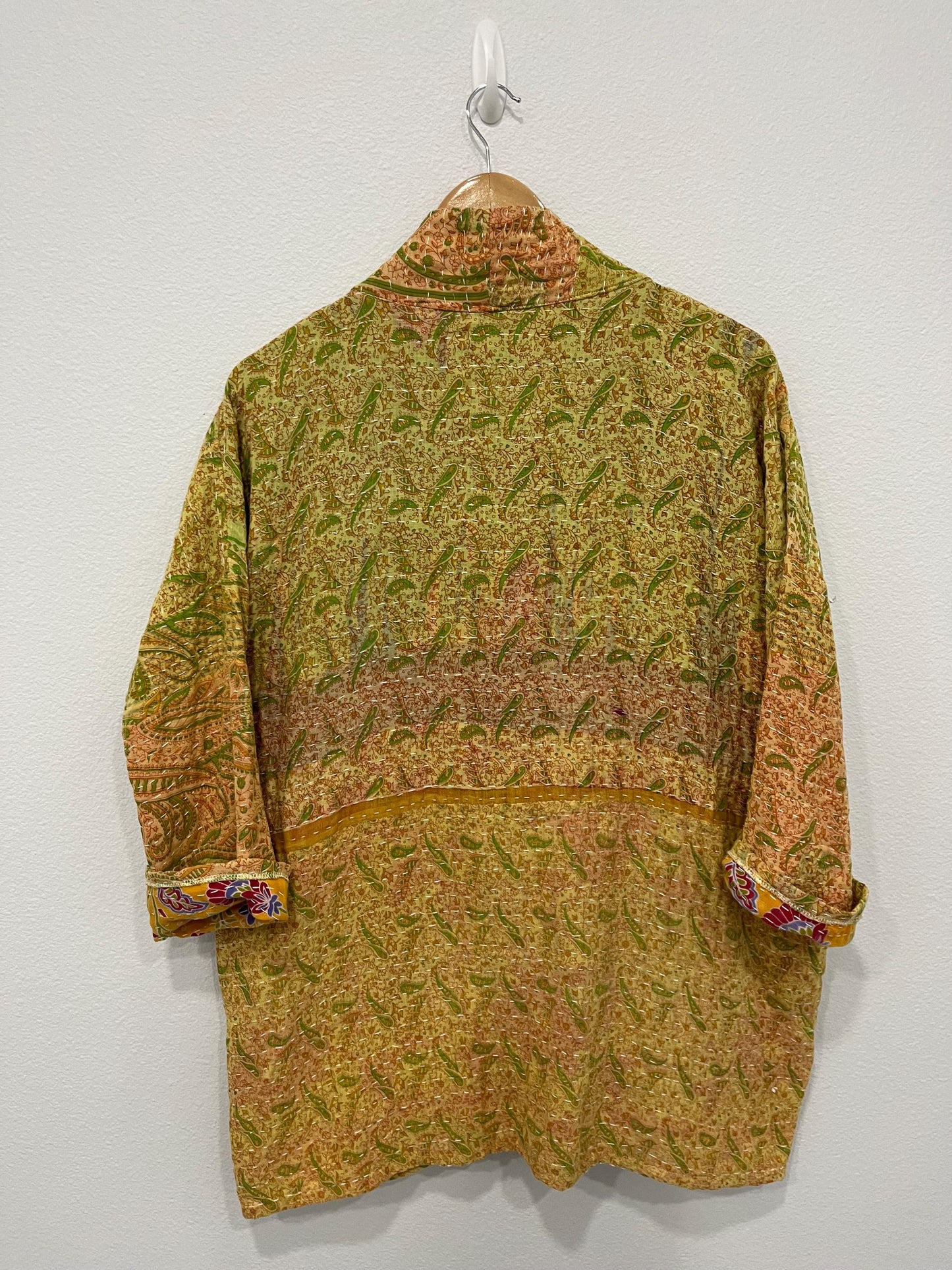 Unique Quilted statement Coat, reversible, sustainable, and made for the woman who lives life with style and grace. it is lovely with a yellow and green ombre effect with large pockets,.