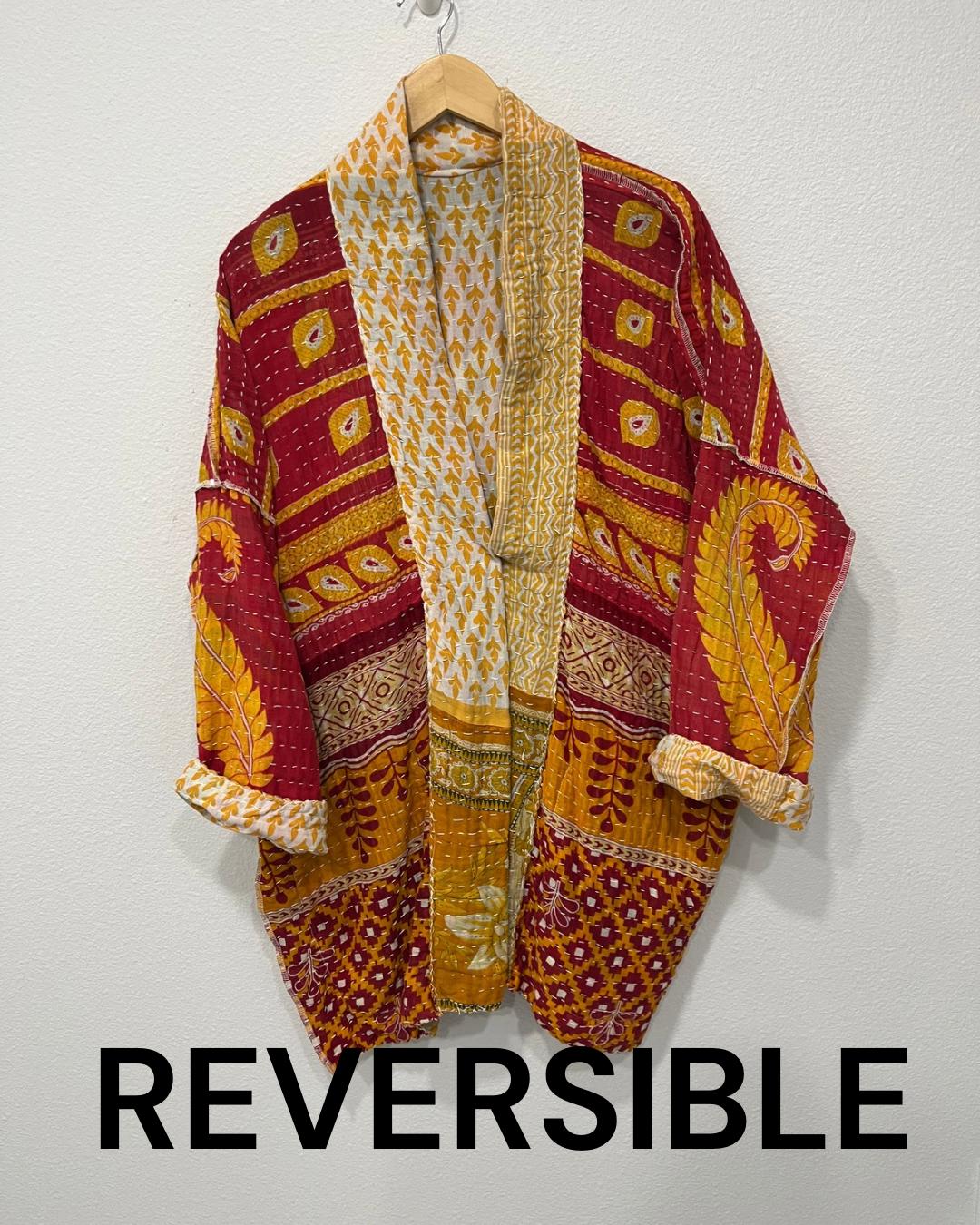 This Yellow, gold and white geometric designed luxury, unique, reversible quilted jacket made for easy traveling in style.