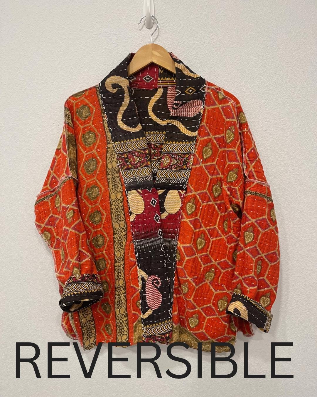 This soft and comfortable, Red, Black and Beige Quilted jacket is made from Kantha Cloth that has a story. It is wonderful for traveling. It is reversable for 2 looks in one and is light weight for easy packing