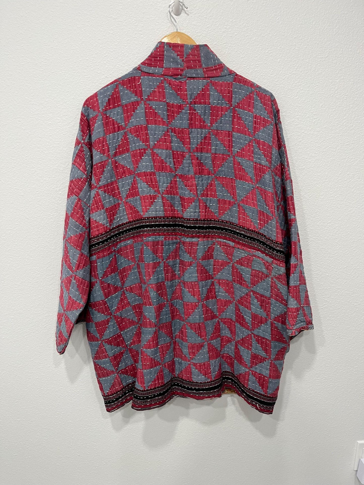 Unique, reversible, quilted, statement jacket made for easy traveling in style. This Blue and Rose-colored piece with floral border. It is comfortable and so soft..