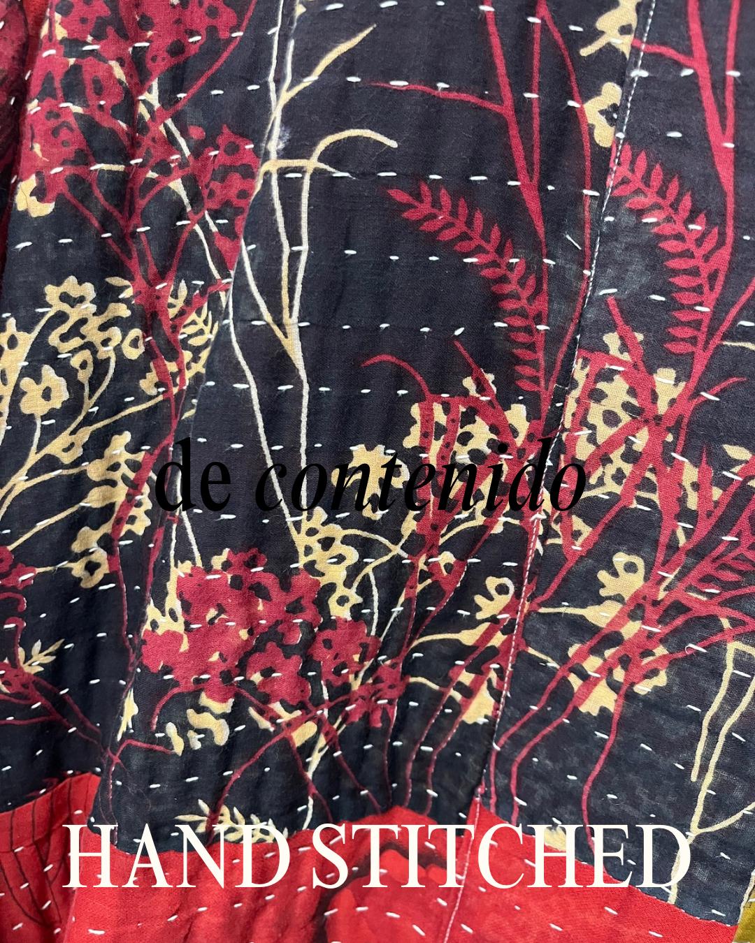 Unique, reversible quilted statement jacket made for easy travel with Red and Black floral Kantha Cloth.
