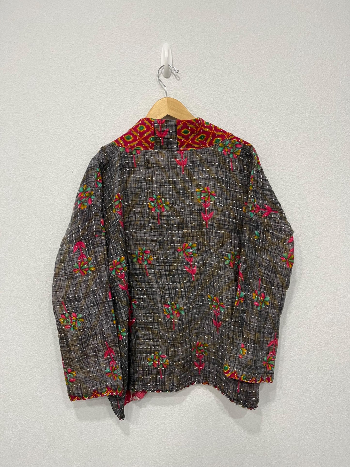 This Gray and Red patterned Boho Quilted Jacket is made with Kantha Cloth. It is reversible for 2 looks in one, sustainably made, and great for traveling.