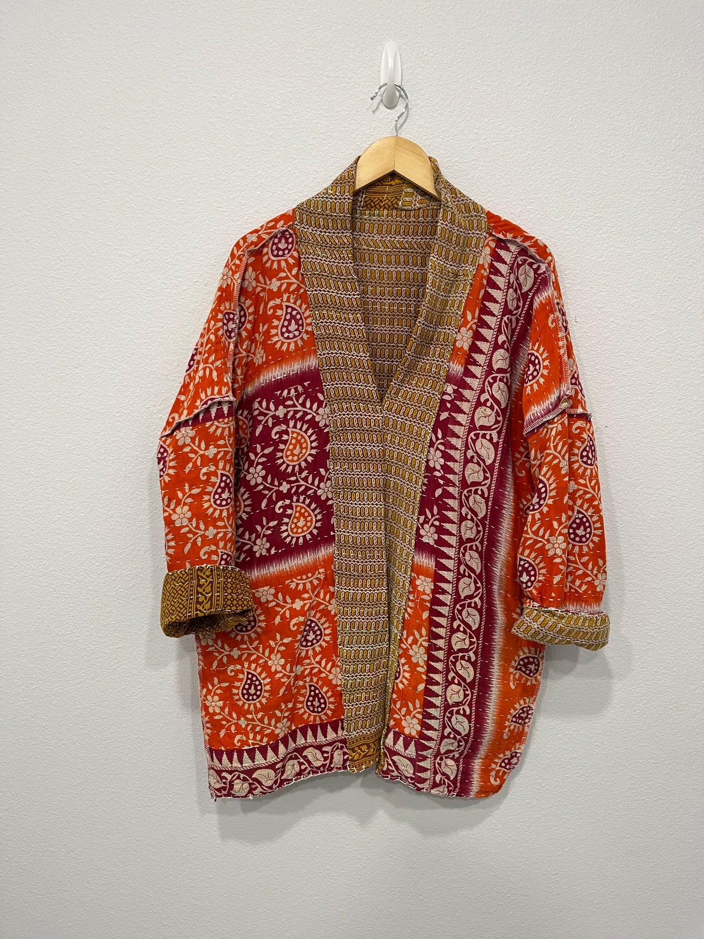 One-of-a-kind, reversible, quilted, Jacket. The modern patchwork makes this lightweight, stylish and comfy.