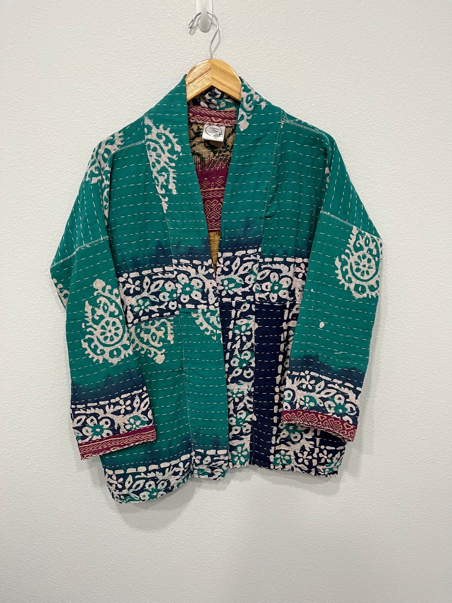 One-of-a-kind, reversible, quilted, Kantha Cloth Jacket. The modern patchwork makes this lightweight, stylish and comfy. Great for travel.