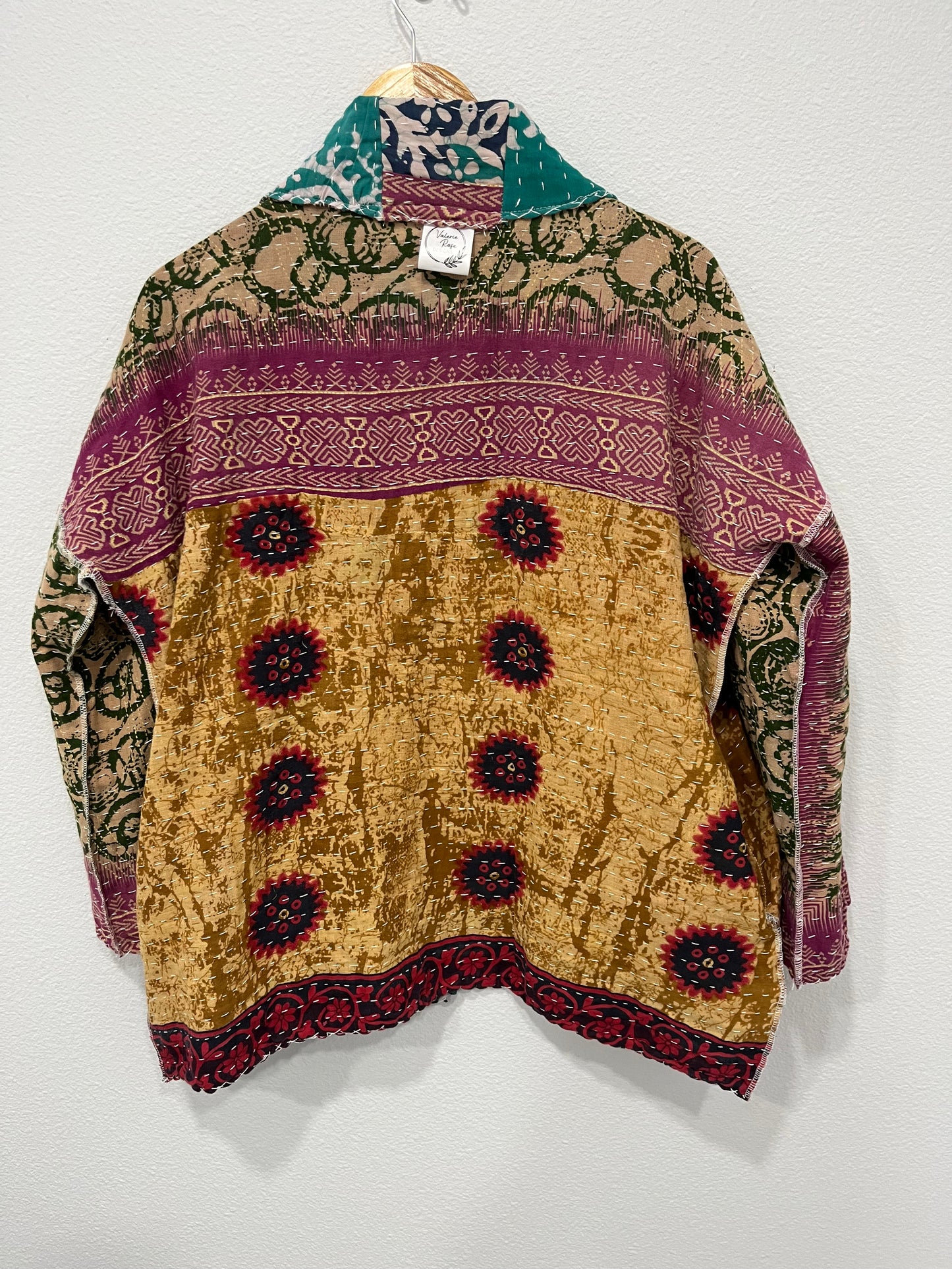 One-of-a-kind, reversible, quilted, Kantha Cloth Jacket. The modern patchwork makes this lightweight, stylish and comfy. Great for travel.