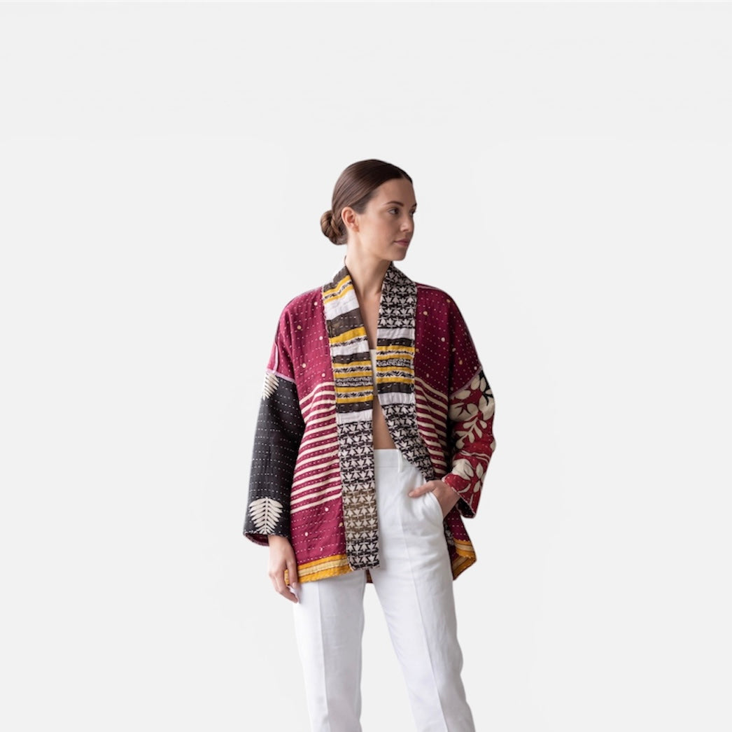 One-of-a-kind, reversible, quilted, jacket. The modern patchwork makes this coat lightweight, stylish and comfy. For confident women.