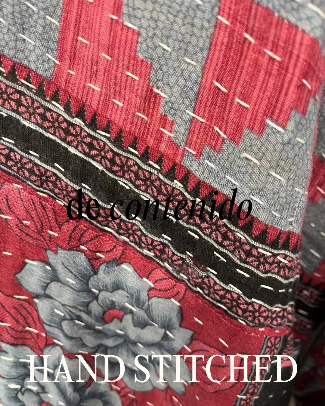 Unique, reversible, quilted, statement jacket made for easy traveling in style. This Blue and Rose-colored piece with floral border. It is comfortable and so soft..