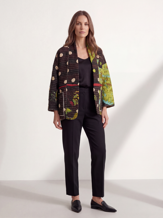 One--of-a-kind reversible, quilted Jacket. This modern patchwork makes this lightweight, stylish and comfy.t
